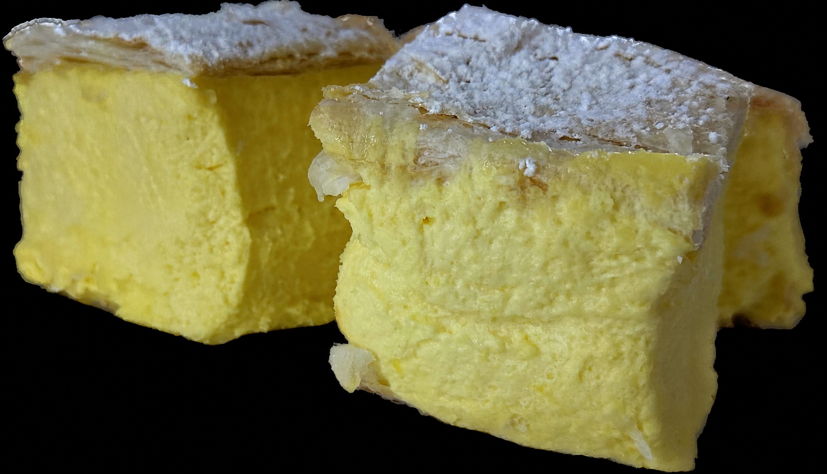 Two generously sized vanilla slices served at Dark Horse Café